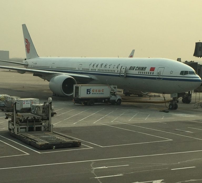 Air China Plane sitting at Airport Gate Air China Plane sitting at Airport Gate